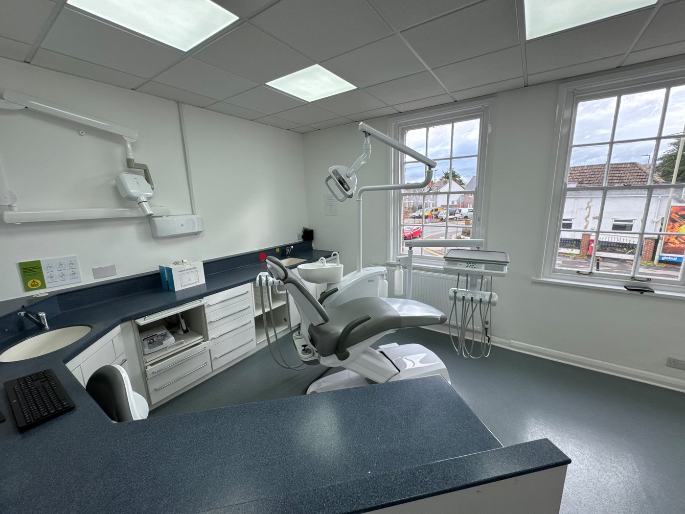 A modern surgery room at GL1 Dental, a short drive from Abbeydale via Painswick Road